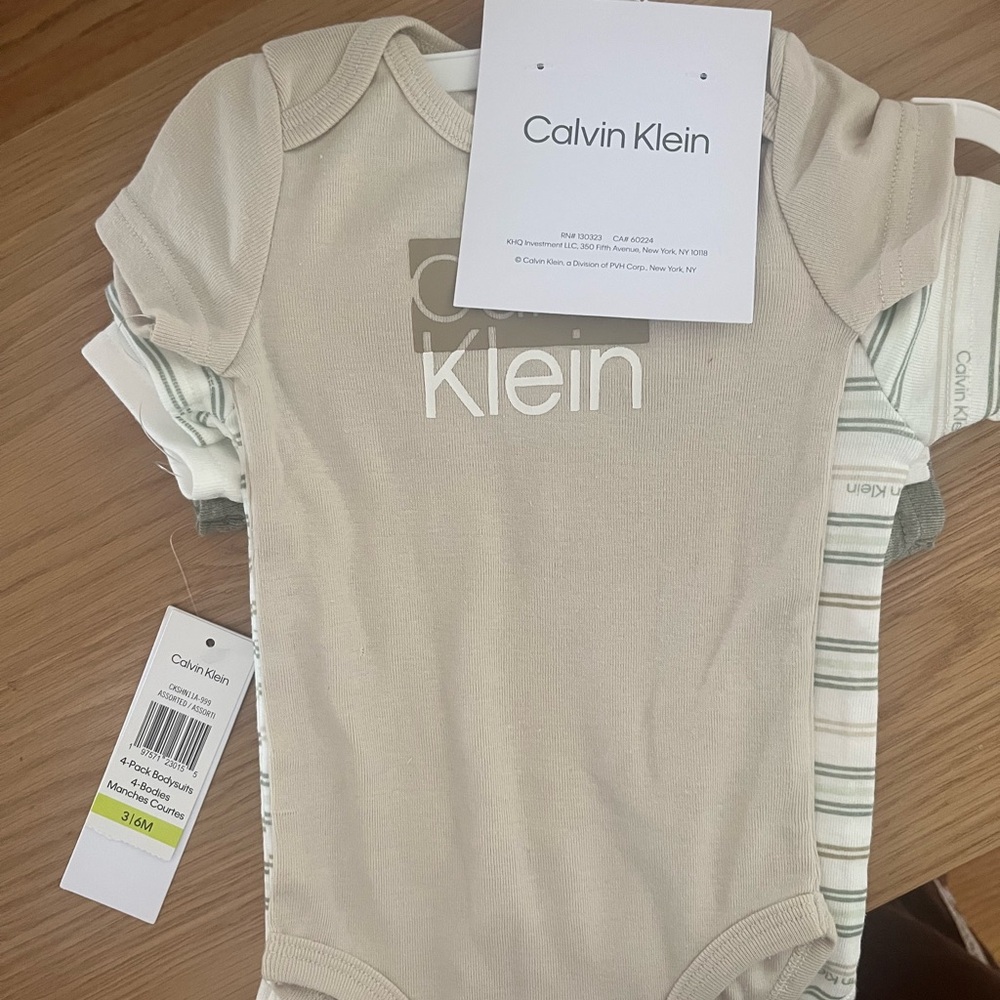Calvin Klein Beige Baby Onesie set of 4